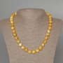 Collana in giadeite gialla, sfere lisce, diametro 10,5 mm ±, lunghezza 49 cm ±