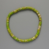 Bracciale in varisite verde chiaro (perle a disco pressate) diametro 4,5×2,5 mm, lunghezza 18 cm ± (elastico)