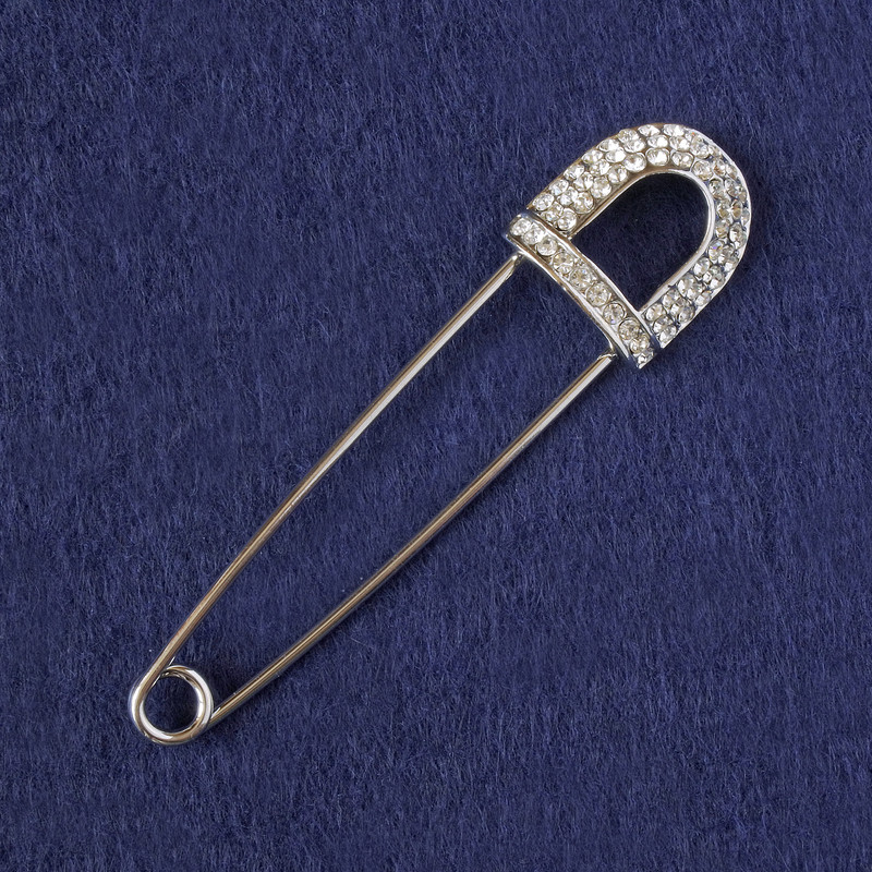 Spilla con strass bianchi, metallo argentato 80x20 mm+