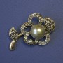 Spilla fiore con perla grigia e strass 48×30 mm ± metallo dorato