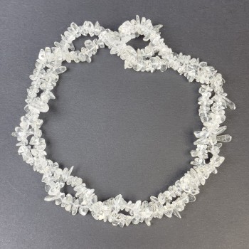 Perle di cristallo di rocca, granuli 4–9×2–4 mm, su filo, lunghezza 80 cm
