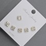 Orecchini a perno con strass bianchi, metallo dorato, 5 mm ±