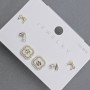 Orecchini a lobo in metallo dorato con strass bianchi a forma di trifoglio 10 mm+