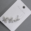 Orecchino kaf per l'orecchio in metallo argentato 14×38 mm ± strass bianchi