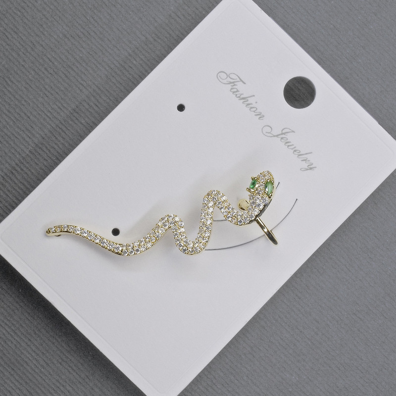 Orecchino clip-on dorato, lunghezza 41 mm ±, strass bianchi e verdi