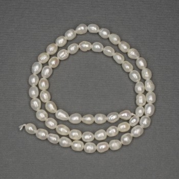 Perle bianche d'acqua dolce ovali su filo, diametro 6x4 mm, 5-5 mm +/- su filo, lunghezza 36 cm+