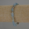 Bracciale in calcite blu, cilindri da 10×6 mm, perline da 3 mm, lunghezza circa 18 cm, elastico