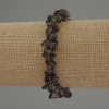 Braccialetto con frammenti di topazio fumé, diametro 7-10×2-4 mm ±, lunghezza 18 cm, elastico