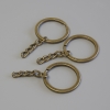 Prezzo per confezione /10 pezzi. Base per portachiavi anello, diametro 28 mm ±, lunghezza 5 cm ±