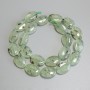 Perline di prehnite ovoidali, dimensioni 18×13 mm, +/- su filo, lunghezza 40 cm+