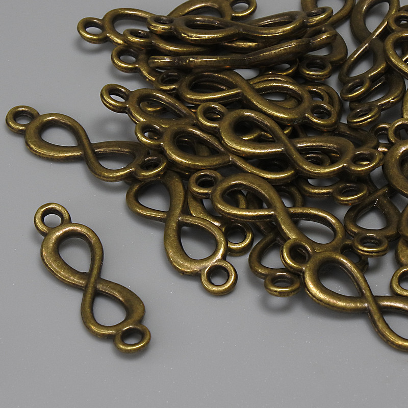 Connettore Infinito bronzo 20×6 mm +/- confezione da 29 pezzi