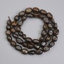Perle di bronzite levigate 6-11×5,5 mm ±, lunghezza 40 cm ± su filo
