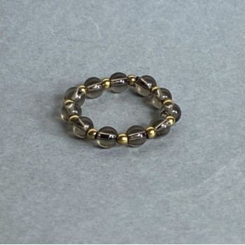 Anello con quarzo fumé a palline lisce, diametro 4 mm ± palline di ematite 2 mm ± base elastica