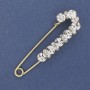 Spilla con perno e strass bianchi, metallo dorato, 79×20 mm