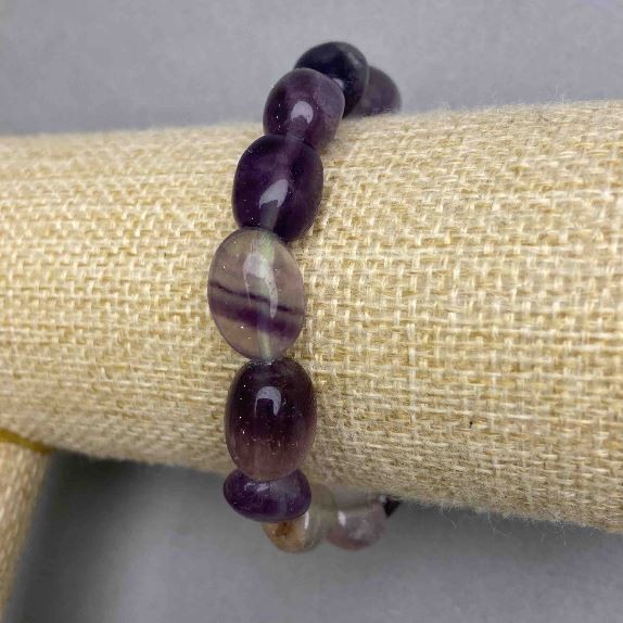 Bracciale in fluorite levigata, diametro 13-15×9,5 mm ±, lunghezza 18 cm ±, elastico