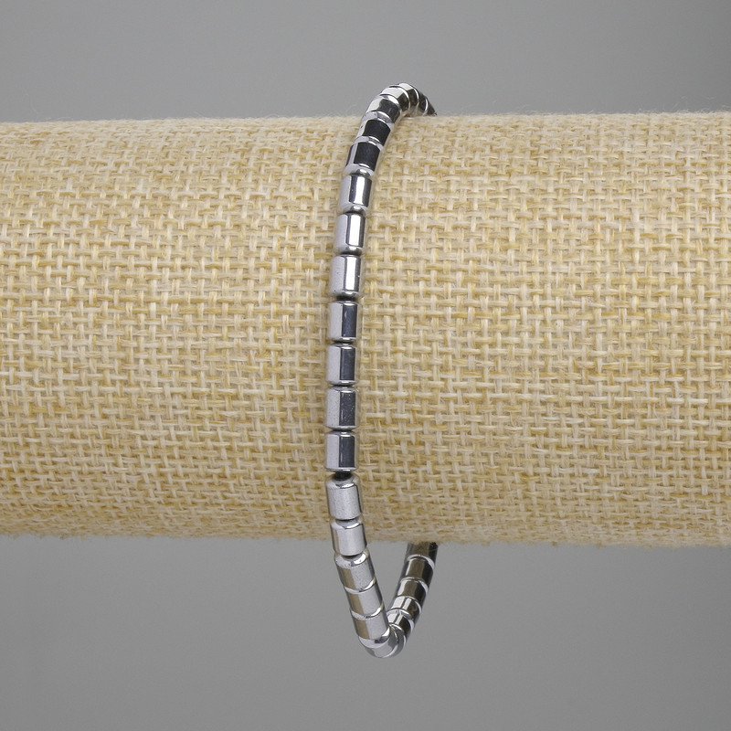 Bracciale in ematite, cilindri 5x4 mm, colore argento, lunghezza 18 cm, elastico