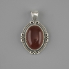 Pendente in corniola 34×21 mm ± metallo argentato