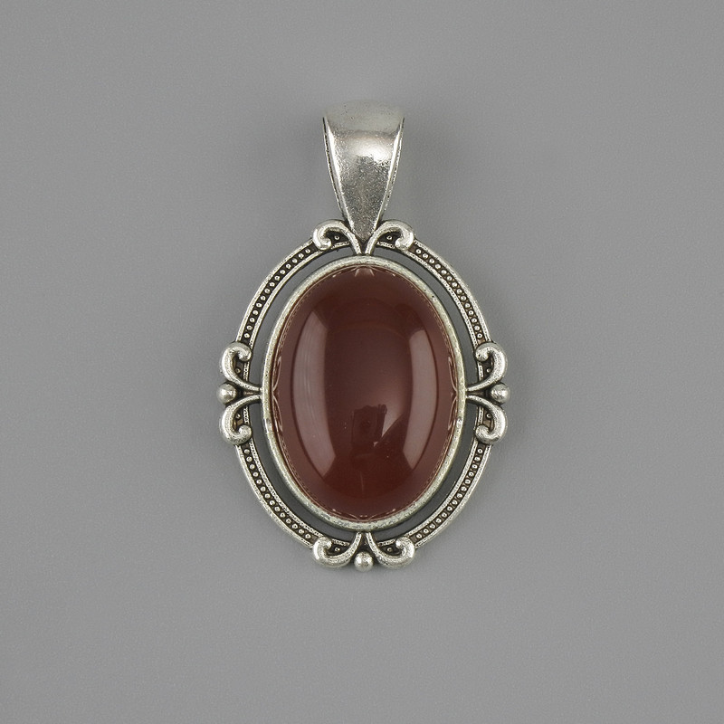 Pendente in corniola 34×21 mm ± metallo argentato