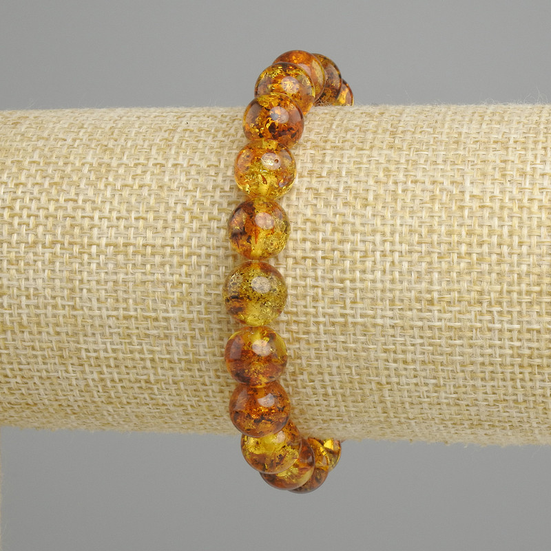 Bracciale Ambra sfera liscia, diametro 9mm+-, lunghezza 18cm stretch
