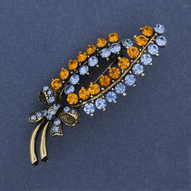 Spilla Ramoscello strass gialli e azzurri metallo argentato 64x23mm +