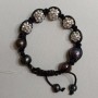 Bracciale con chiusura regolabile
