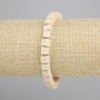 Bracciale lava vulcanica beige — cubi 6x6 mm, lunghezza circa 18 cm, elastico