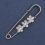 Spilla a spillo strass bianchi 48x10mm+- metallo argentato