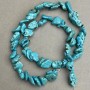 Perle Howlite turchine levigate 14–16×9–11 mm, lunghezza 40 cm ± su filo