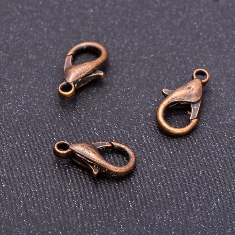 Prezzo per confezione / 10 pezzi. Chiusura in rame 16×8 mm
