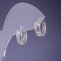 Orecchini Xuping rodiati con strass bianchi