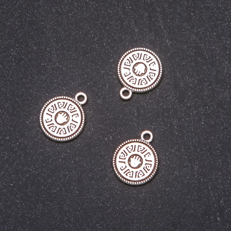 Pendente Moneta palma 15×18 mm, confezione da 20 grammi +/- 9 pezzi