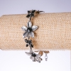 Bracciale da sera 'Gigli' con cristalli neri, colore 'argento antico', larghezza 25 mm, lunghezza 19-25 cm