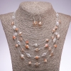 Set orecchini e collana «Sulle corde dell'anima» con perline cubiche di colore champagne, diametro 5–8 mm, lunghezza 45–50 cm