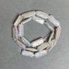 Perle barocche su filo con riflesso petrolio caldo, diametro 10×21 mm, lunghezza 41 cm (+/-)