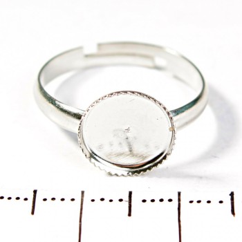 Prezzo per confezione /10 pezzi - Base circolare per orecchini con bordo dentellato da 10 mm