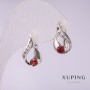 Orecchini Xuping rodiati con pietre rosse 17x10 mm