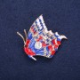 Spilla farfalla con strass bianchi e smalto blu e rosso, 40x38 mm, metallo giallo