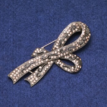 Spilla a fiocco con strass dorati, metallo dorato 39×80 mm