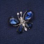 Spilla Farfalla con cristalli bianchi e blu, metallo argentato 28×38 mm