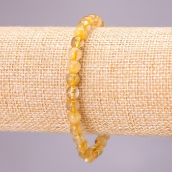 Bracciale elastico in quarzo rutilato naturale con sfere lisce, diametro circa 6 mm, lunghezza 18 cm