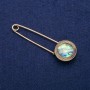 Spilla a spillo con cabochon Haliotis 23×75 mm, metallo dorato