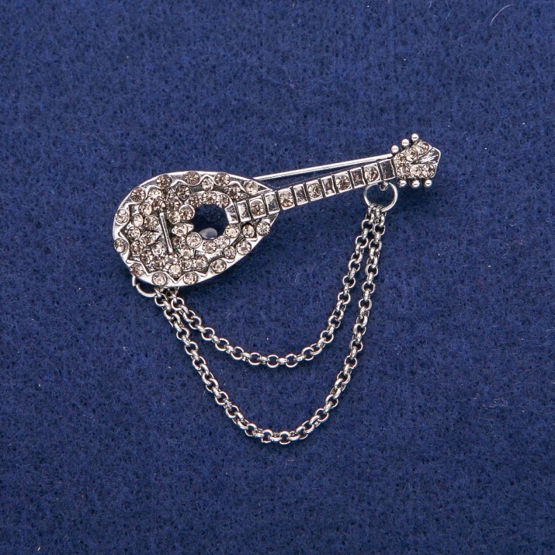 Spilla Liuto con strass grigi 17×50 mm, metallo argentato