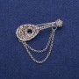 Spilla Liuto con strass grigi 17×50 mm, metallo argentato