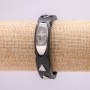 Bracciale con inserti metallici, lunghezza 21 cm, spessore 15 mm, gomma nera, con chiusura