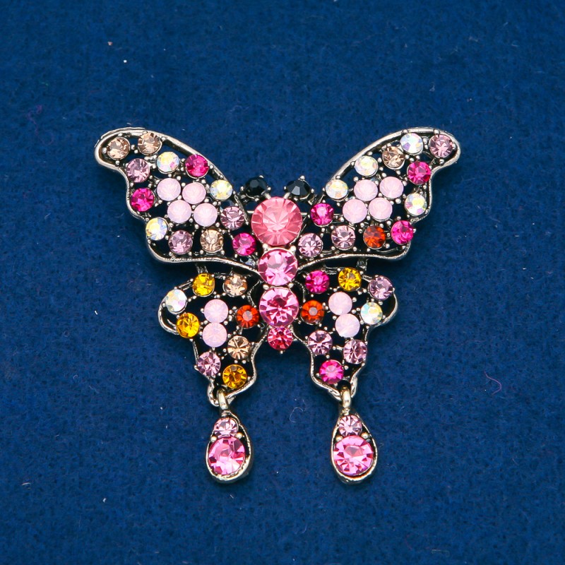 Spilla a forma di farfalla in metallo dorato, strass multicolori 48 × 60 mm +