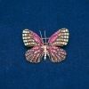 Spilla «Farfalla» in metallo dorato, rosa, dorati e bianchi strass 38×47 mm +