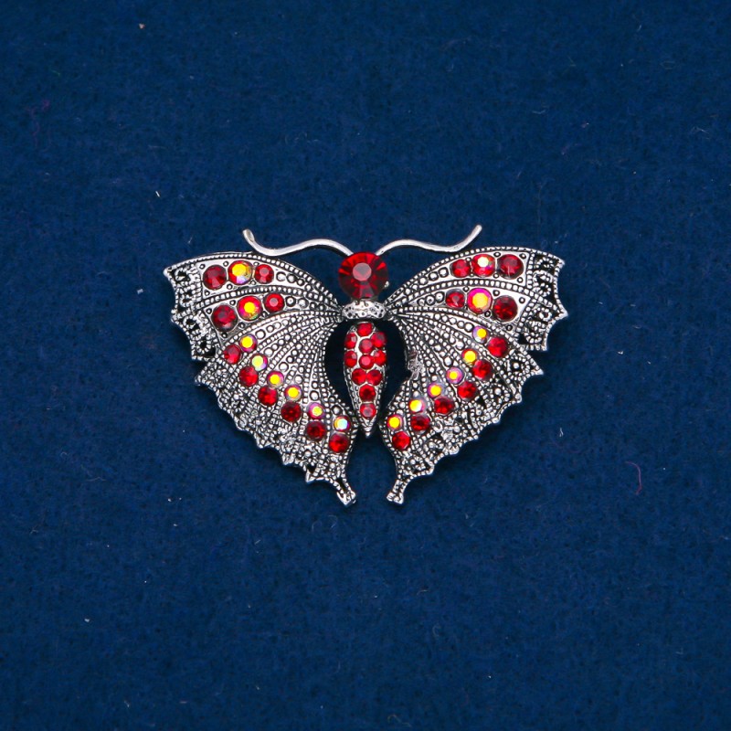 Spilla farfalla argentata con cristalli bordò e petrolio 35×50 mm +