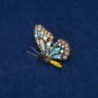 Spilla farfalla in metallo dorato, strass multicolori 40x28mm +