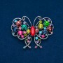 Spilla farfalla in metallo argentato, strass multicolori 48×60 mm +