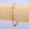 Braccialetto Xuping doratura in oro 18K con strass bianchi, spessore 3,5 mm + -, lunghezza 17-20 cm +